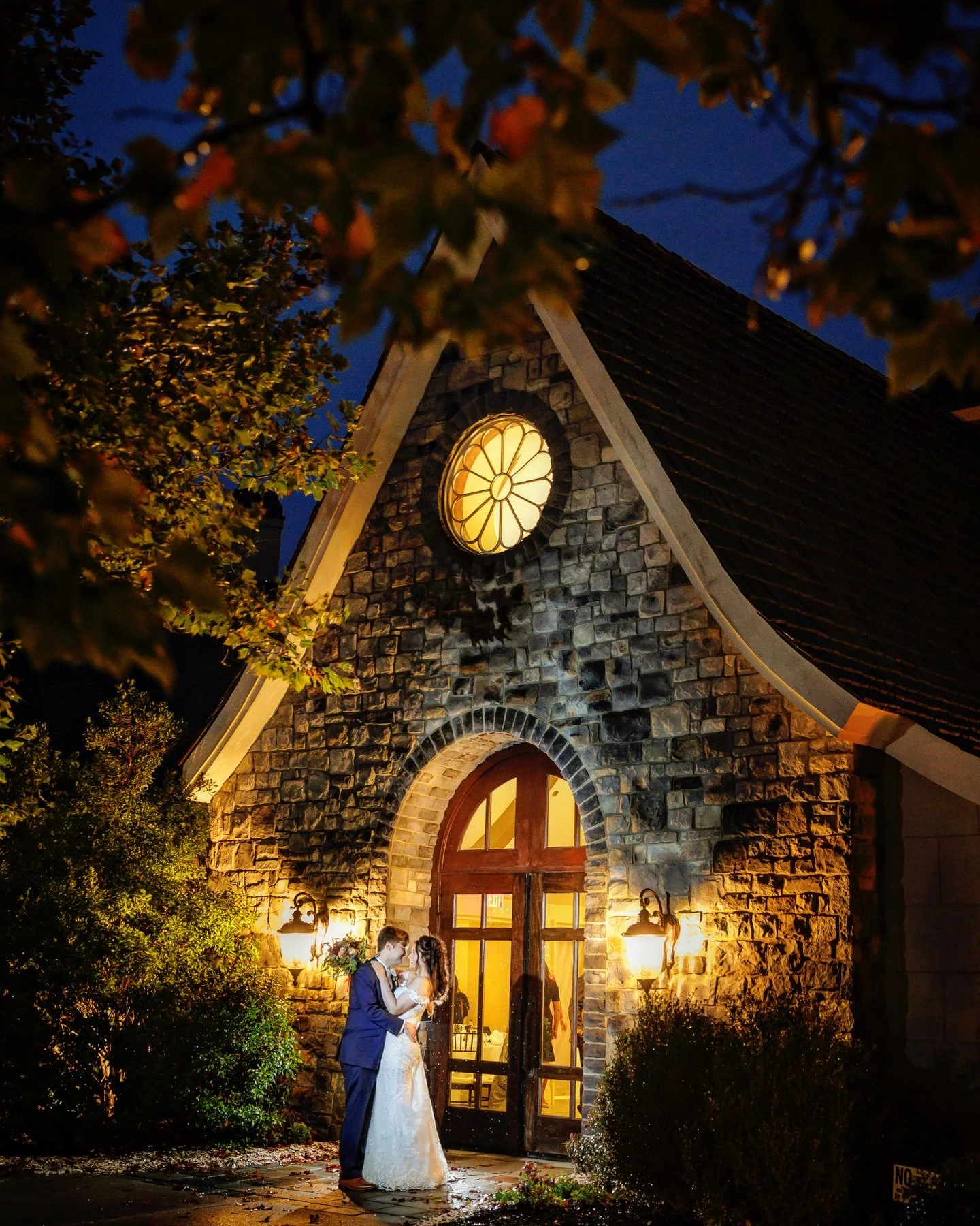 How&rsquo;d you all fair last weekend with the heavy rain? I thought it might be best to lean on what I know I can do in less than perfect weather: night shots! I had the couple stand in the overhang of the stone church and managed to catch blue hour