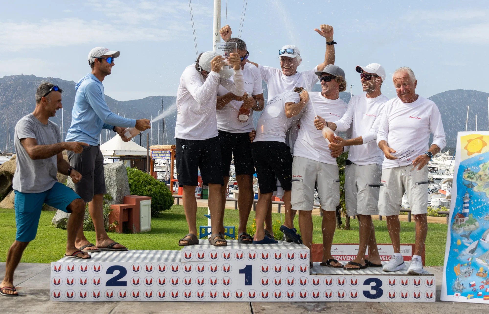 WILMA AND NIKA ON THE FIRST STEP OF THE PODIUM OF THE MELGES WORLD LEAGUE SARDINIA GRAND PRIX IN VILLASIMIUS