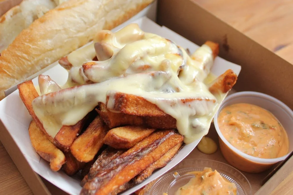 DUCK FAT FRIES WITH RACLETTE CHEESE