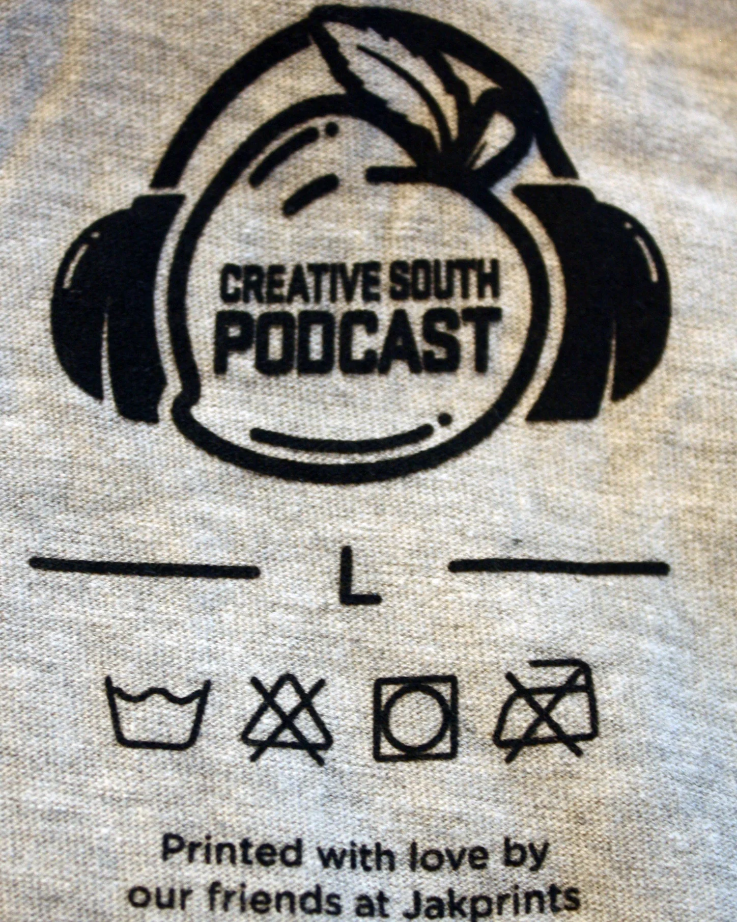 Gray Creative South Podcast Shirt Tag