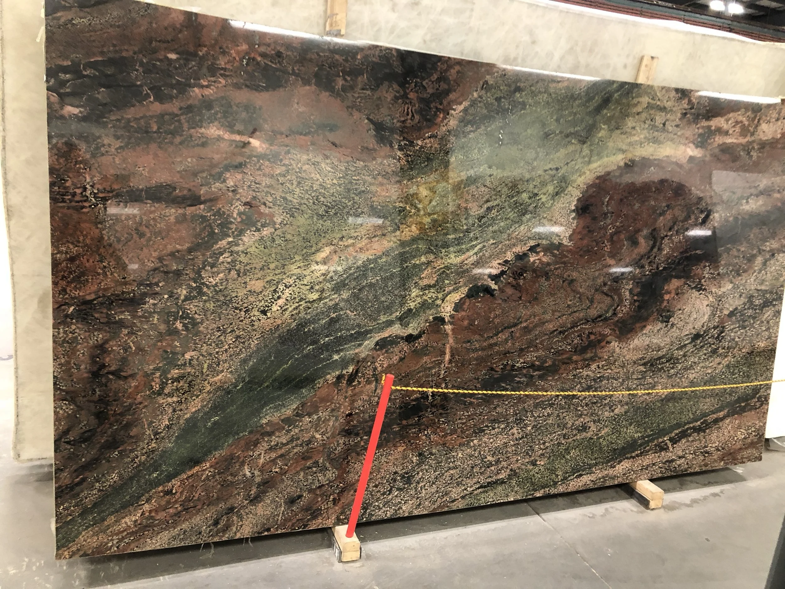 Verde Fuoco Granite Slab as focal point in kitchen remodel