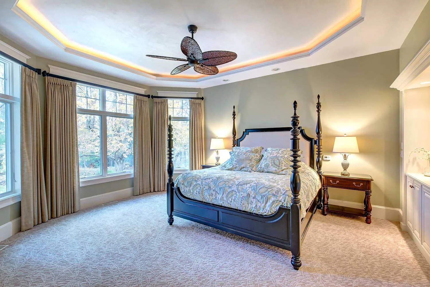 The bedroom furniture is from Hooker Furniture's Estate Line and the draperies are custom.