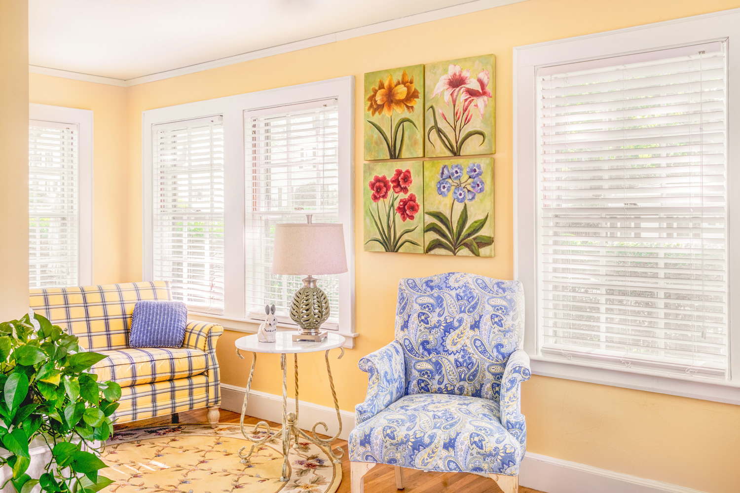 The loveseat fabric is a buffalo plaid of yellow and blue.