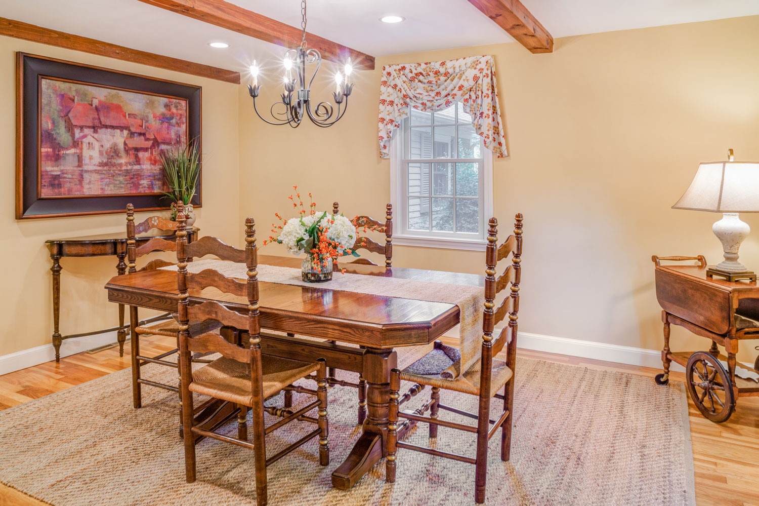 The redesign used the homeowner’s existing colonial dining table and chairs.
