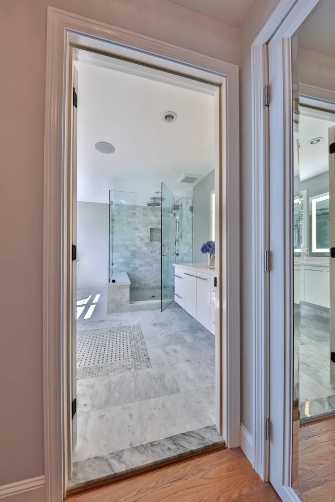 This bath also has electric radiant floor heat, LED downlighting, and Panasonic exhaust fans.