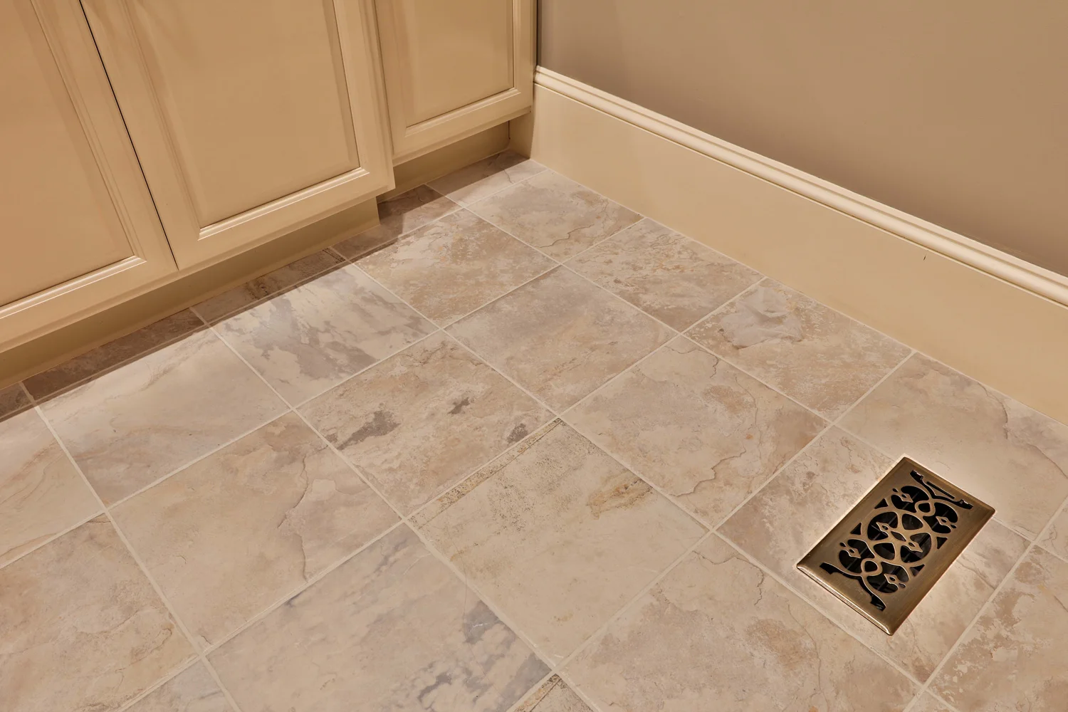 Tile flooring in the laundry room and bath.