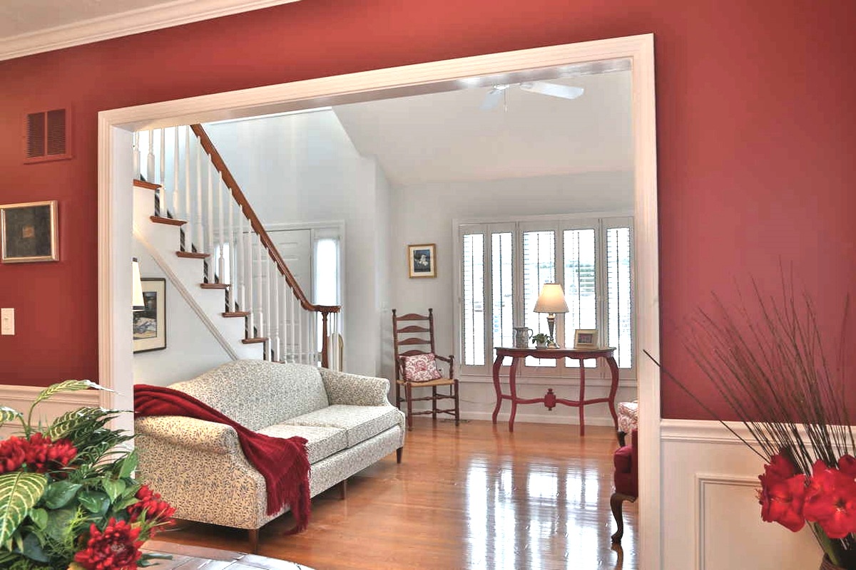 Disbursement of existing furniture and area rugs opened the space, removed trip points and highlights accessories.