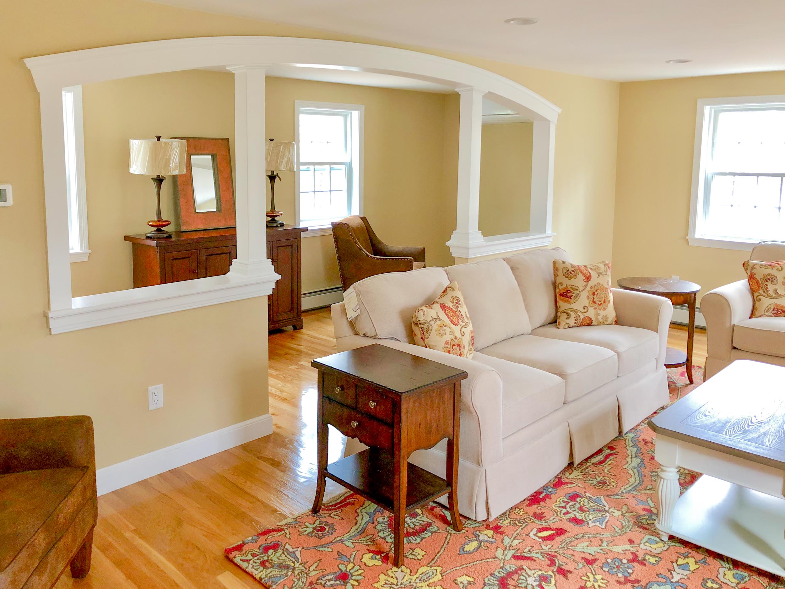 Everything in this family room was custom from window treatments, sofa's, pillows, and the suede leather chairs.