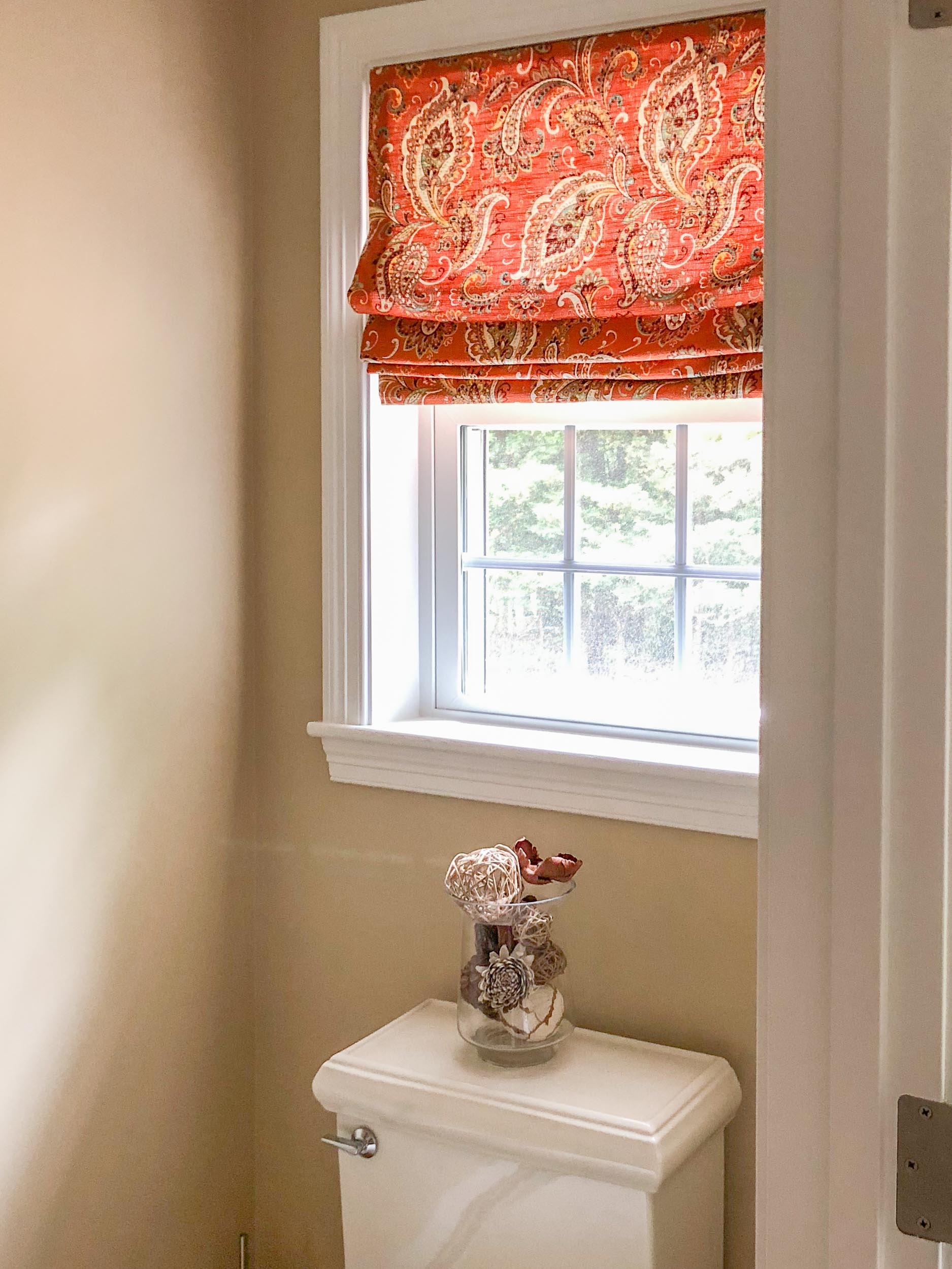 A small powder room was designed for the space.