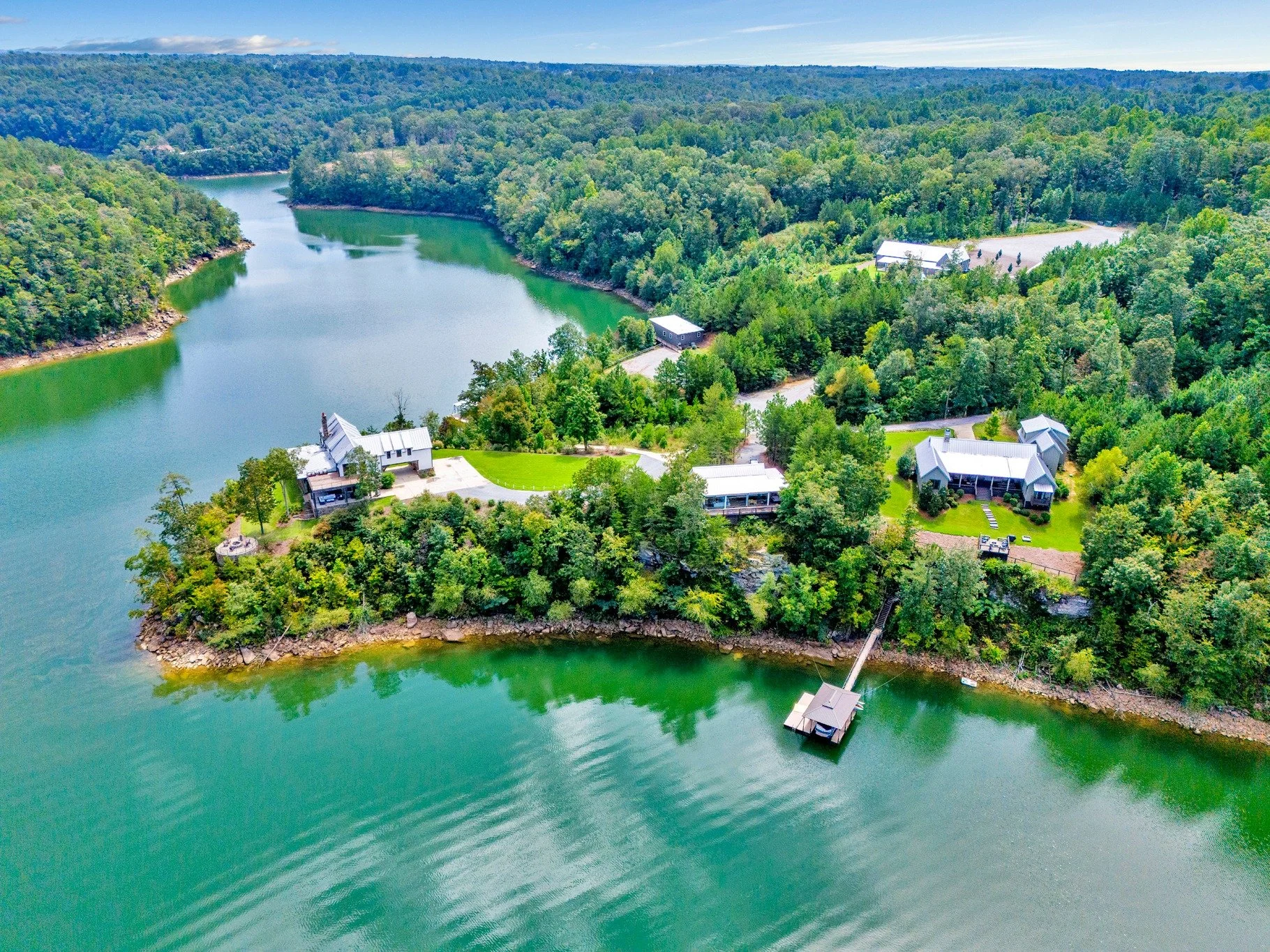 The Barn at Smith Lake wedding venue with lake views, rustic barn reception space, and outdoor ceremony setting near Birmingham, Alabama
