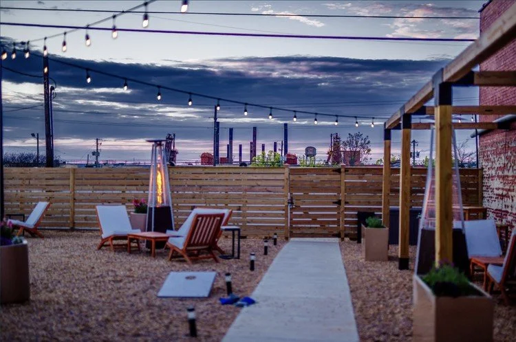 Outdoor courtyard at Avenue D Events in downtown Birmingham, Alabama, ideal for wedding receptions and events catered by Tre Luna Catering.