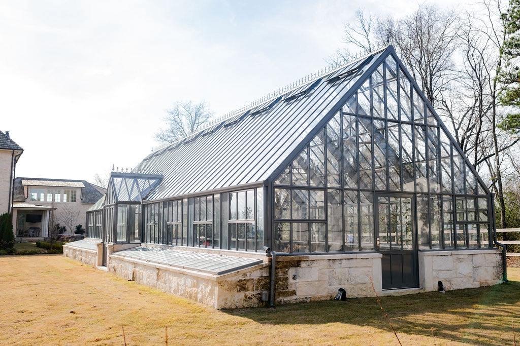 The Conservatory at Crosswicks wedding venue with glass conservatory, garden grounds, and outdoor pavilion in Birmingham Alabama.