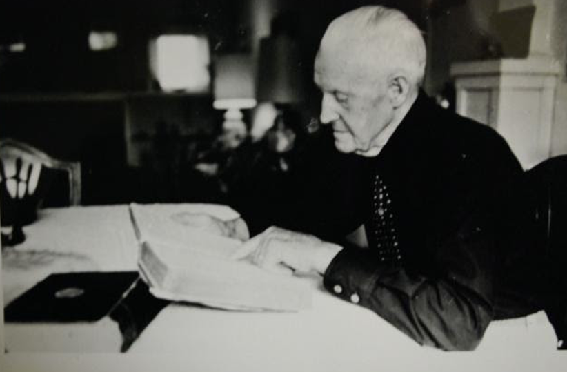 photo from Harold Paulsen, elder reading Scriptures.png