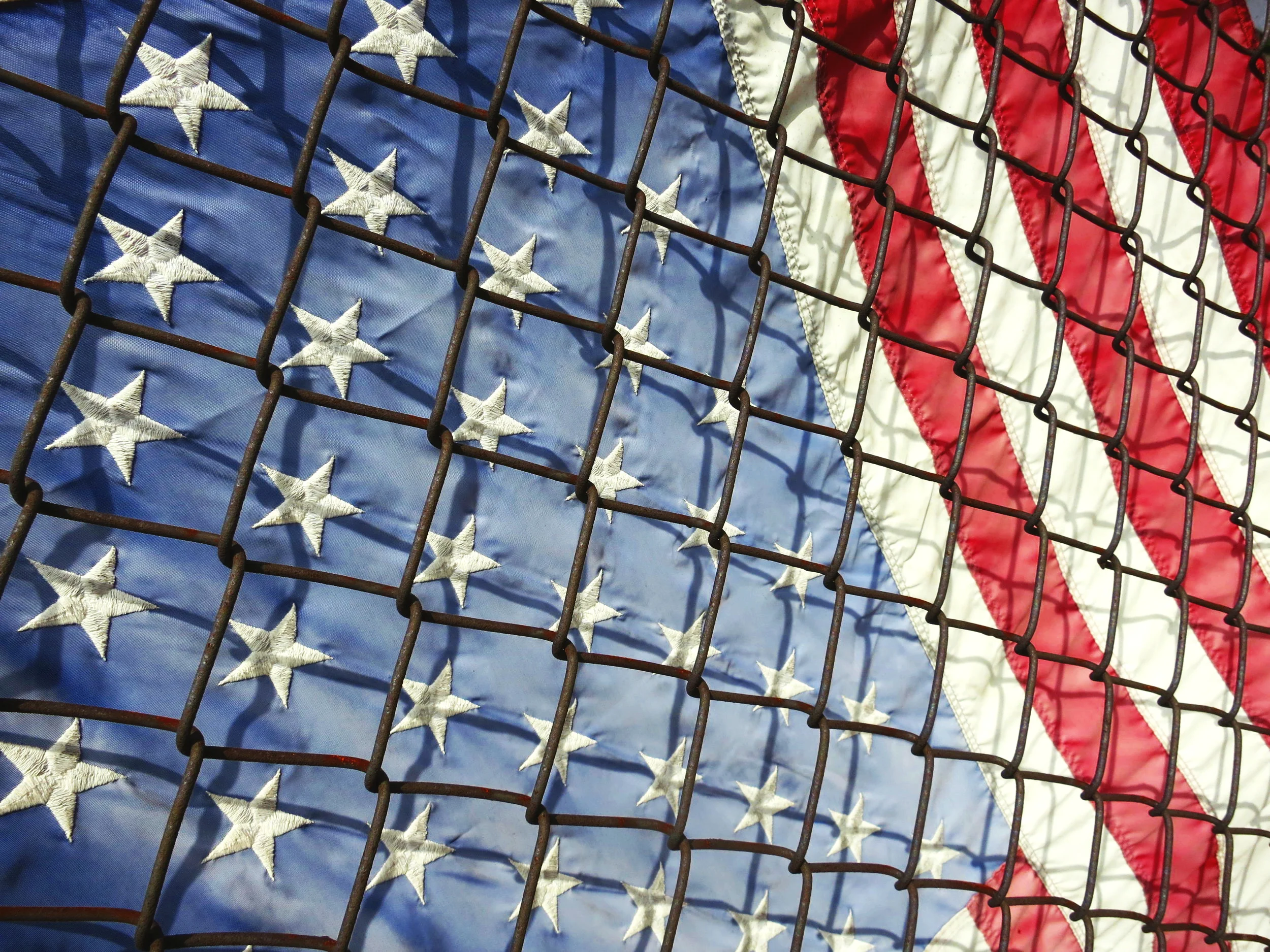 Flag & chain link fence.JPG