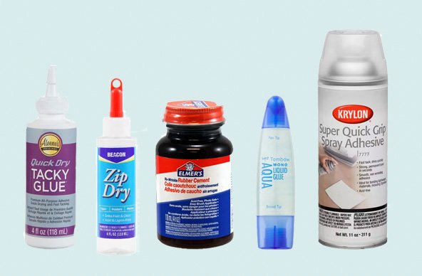 Different glues to assemble houses and  vellum windows and krylon protective spray.