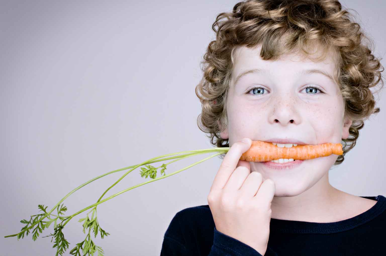 boy eating carrot.jpg
