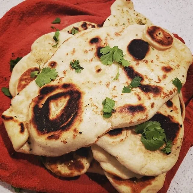 Pillowy, soft, chewy, did I say soft? Homemade naan. Delightfully simple, and now to play with different flavors! #naan #homebaker #bread #soft