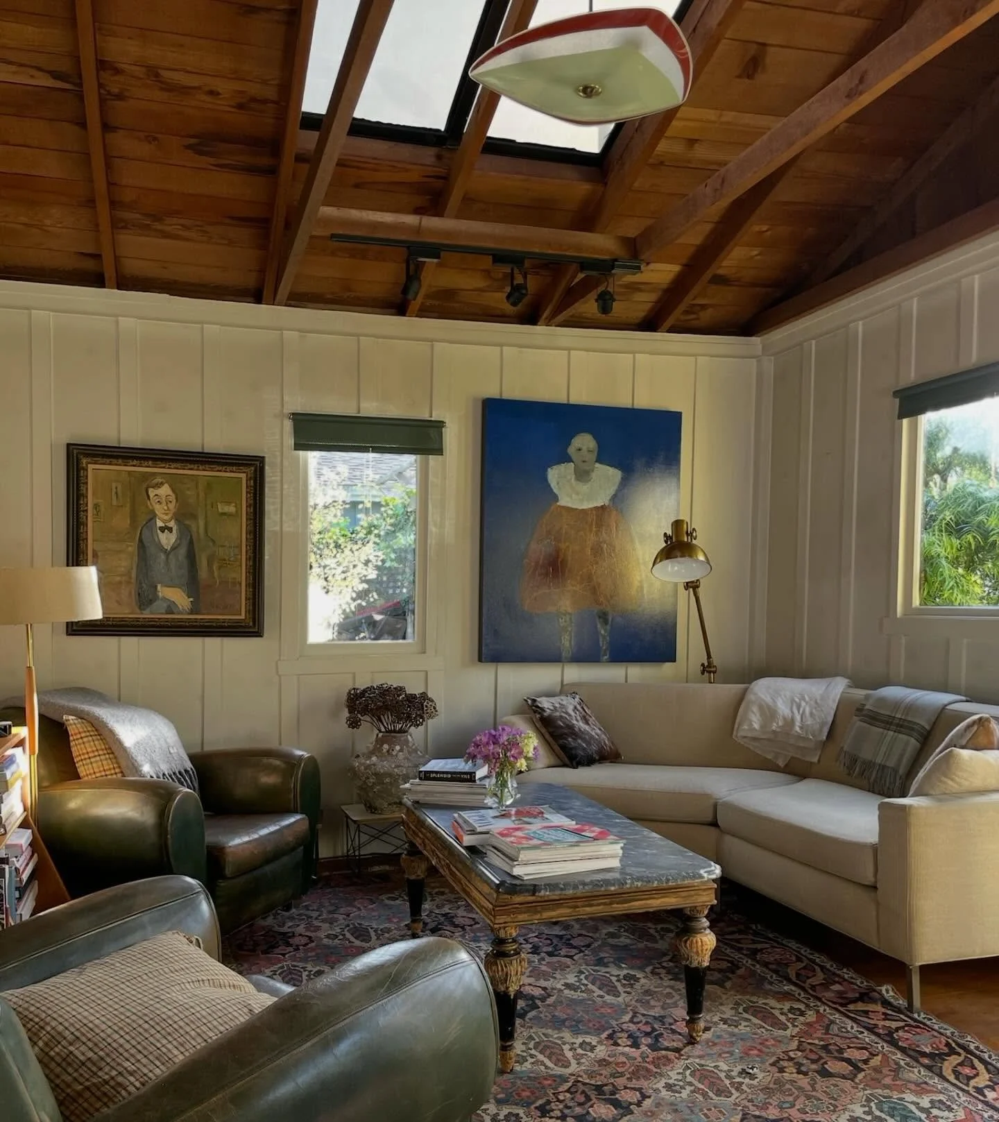 I love the instant transformation of painting or wallpapering a room. When we bought our bungalow, it was painted a rather harsh white. Just the softening of the shade, and the exposing of the old wood floors brought a coziness to the space that stil