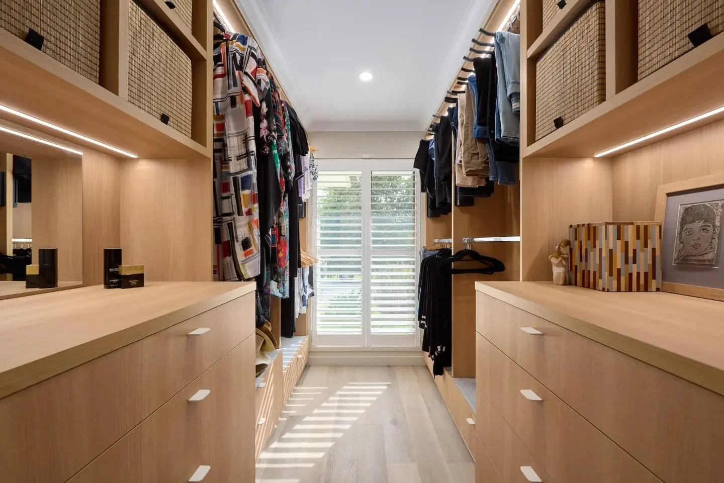 The perfect walk-in robe isn't just about storage; it&rsquo;s about the experience of the space. 💡
We love how the integrated LED lighting in this build highlights the natural timber tones and provides a warm, high-end feel even before the morning s