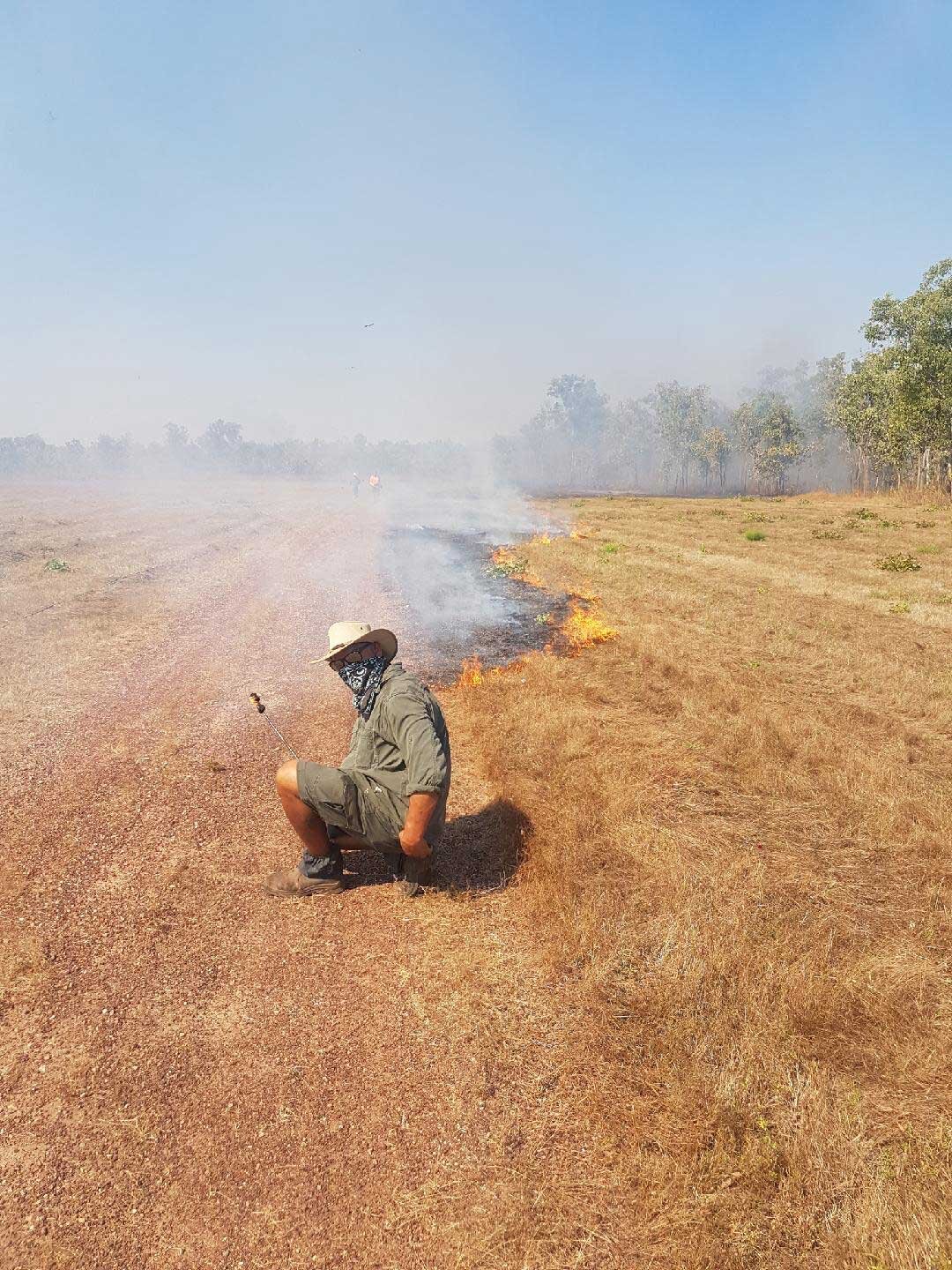 Putting out fires on the airfield in Kakadu