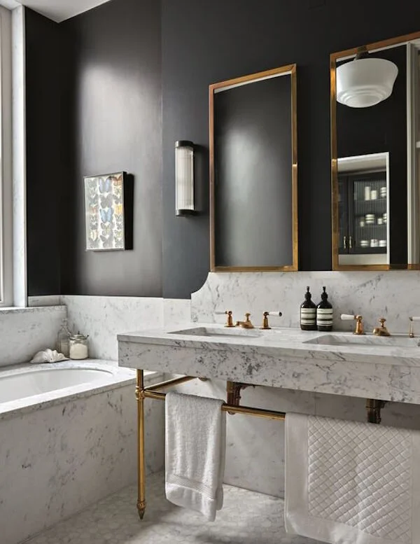 Brass-Finish-and-Black-Wall-in-a-Marble-Bathroom.jpg