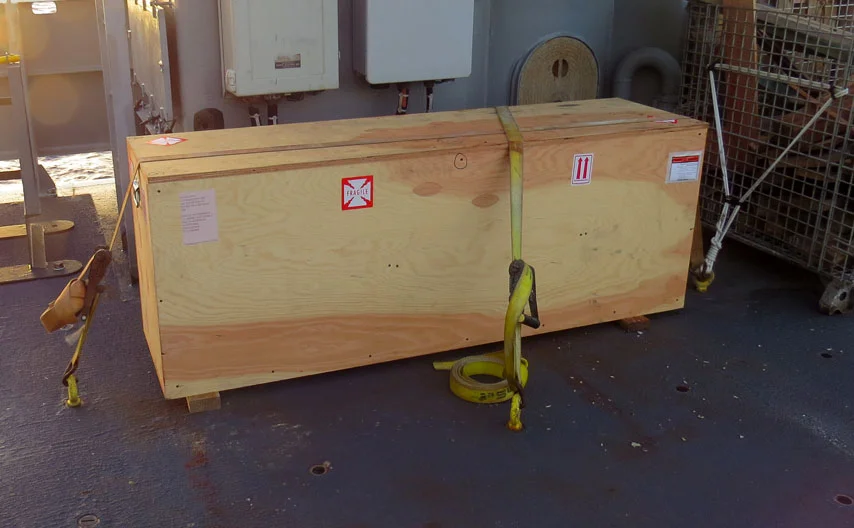 The Scared Heart Star of the Seas in her shipping crate; awaiting unpacking on the deck of the R/V Thomas G Thompson