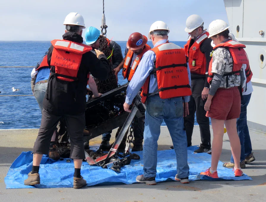 The scientists emptying dredge 27