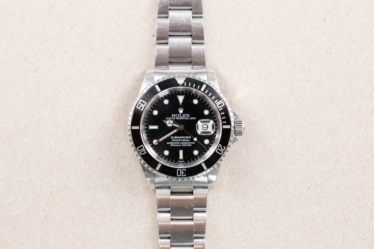Rolex_16610_Submariner_Date_Swiss_Only_1999_Papers_1.jpg
