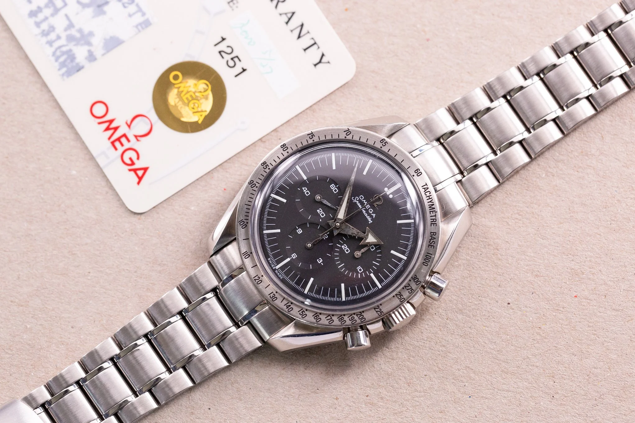Omega_Speedmaster_Reissue_Moonwatch_Broad_Arrow_57_Box_Card_3594_20-2.jpg