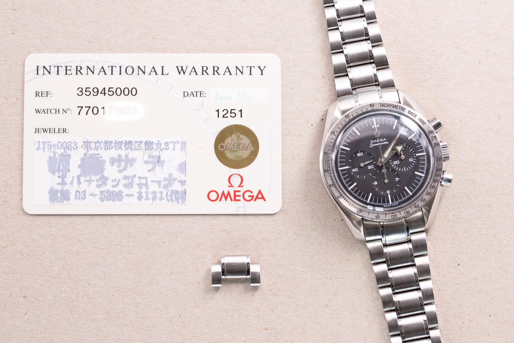 Omega_Speedmaster_Reissue_Moonwatch_Broad_Arrow_57_Box_Card_3594_18-2.jpg