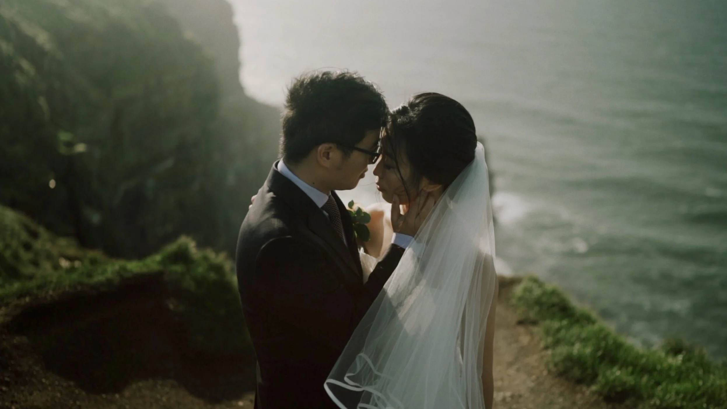Anqi and Shihao together during their Cliffs of Moher elopement