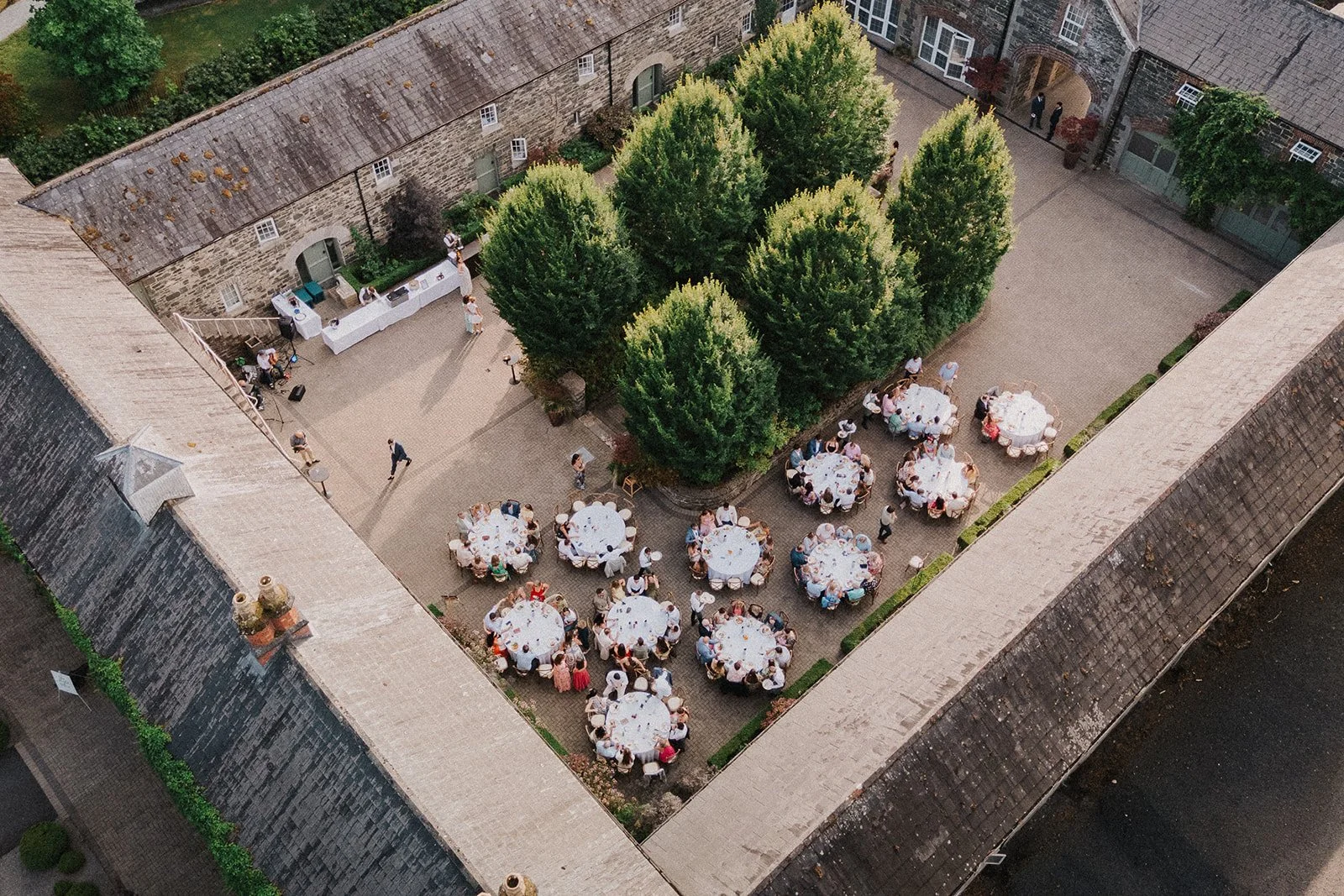 Rehearsal dinner celebration in the courtyard at Virginia Park Lodge