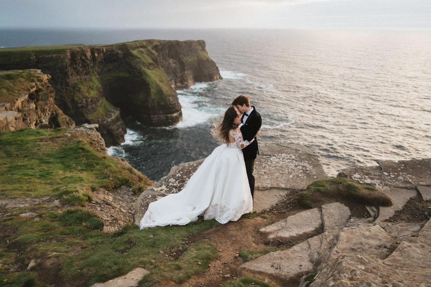Couple at the Cliffs of Moher during their elopement in Ireland.