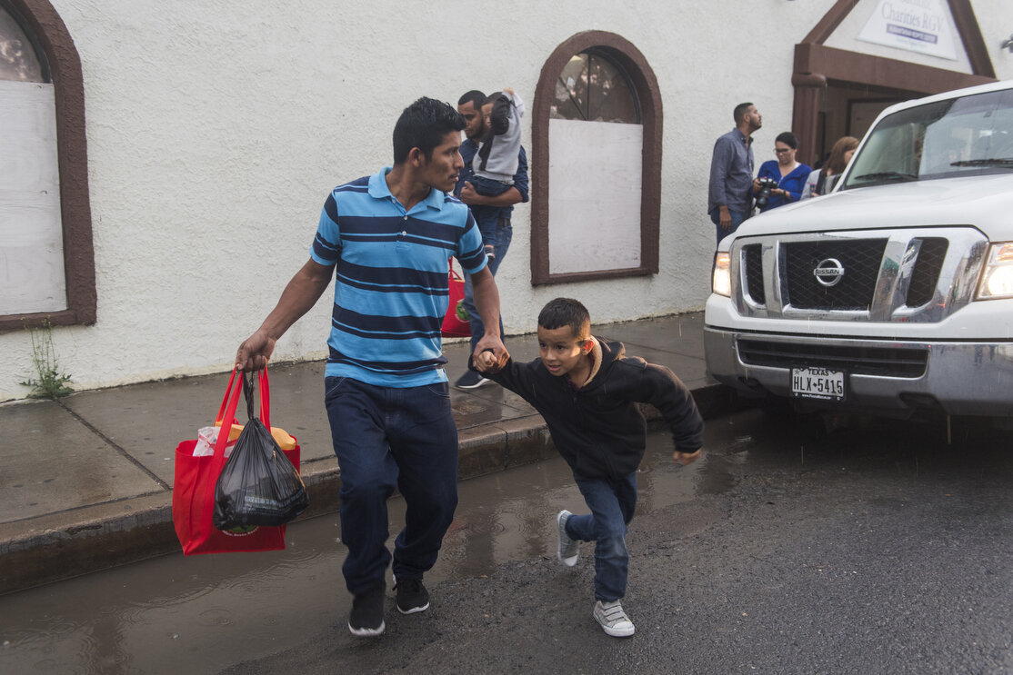 Central American migrant families wait to be taken to the McAllen bus station from the Catholic Charities Humanitarian Respite Center on Tuesday, June 19, 2018, in McAllen, TX. The families were processed and released by U.S. Customs and Border Prot