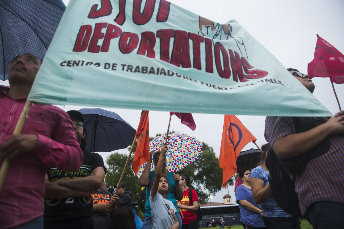 Elizabeth Reyna, 7, joins her family at a Vigil and prayer walk at Archer Park on Wednesday, June 20, 2018, in McAllen, TX. Participants walked from the park to the federal courthouse a few blocks away, in honor of immigrant families and children wh