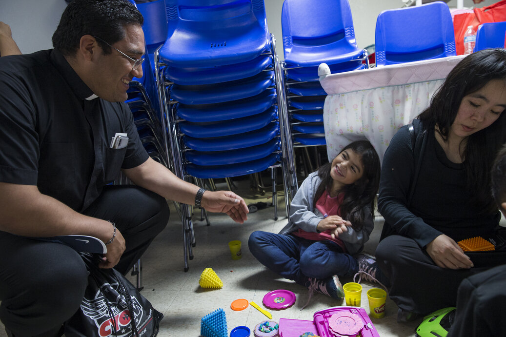 Immigrant families seek relief at the Catholic Charities Humanitarian Respite Center after being processed and released by U.S. Customs and Border Protection on Thursday, June 21, 2018, in McAllen, TX. The center provides aid to families in crisis,