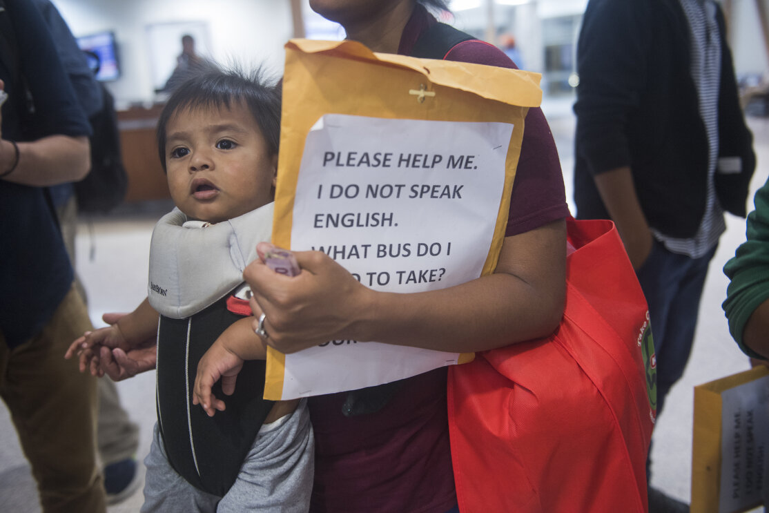  Maydéí Galdames, 25, waits in line at the McAllen bus station after leaving border patrol processing and the Catholic Charities shelter on Tuesday, June 19, 2018, in McAllen, TX. It's unclear why some asylum seekers were being separated from their c