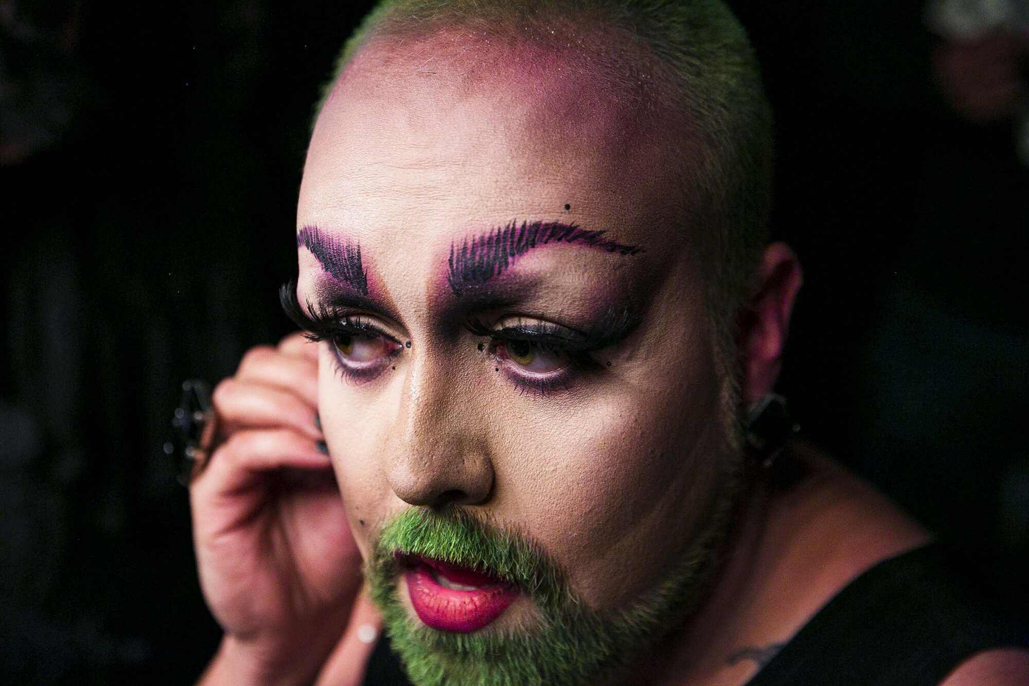  Robby, drag name, EmmaSis, prepares to take the stage during drag fest in Austin, Tx. 