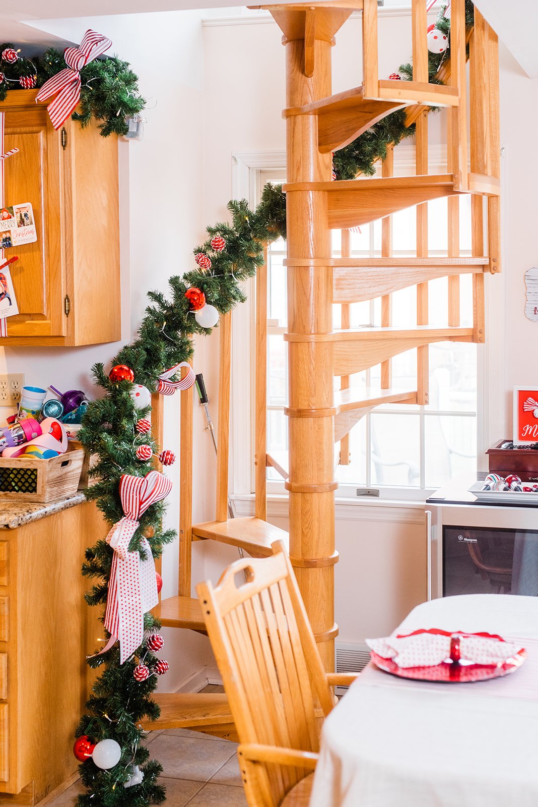 Inspired by the magic of Christmas, and frequent hosting of kid-friendly events, it was important to design our client’s kitchen in such a way that brought those bright and cheerful colors to life and fun with a pencil tree and holiday card holders a