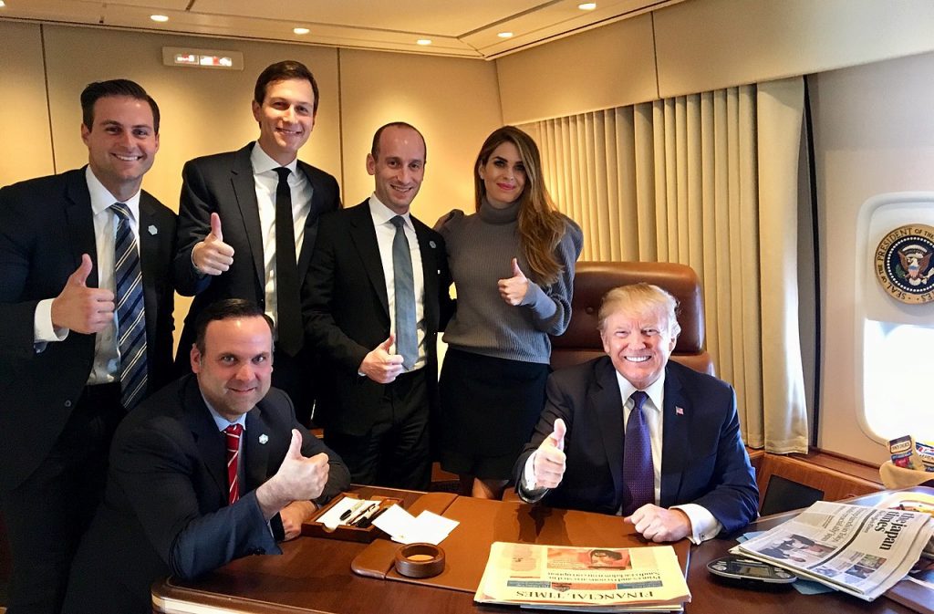 1280px-Donald_Trump_and_staff_on_Air_Force_One.jpg