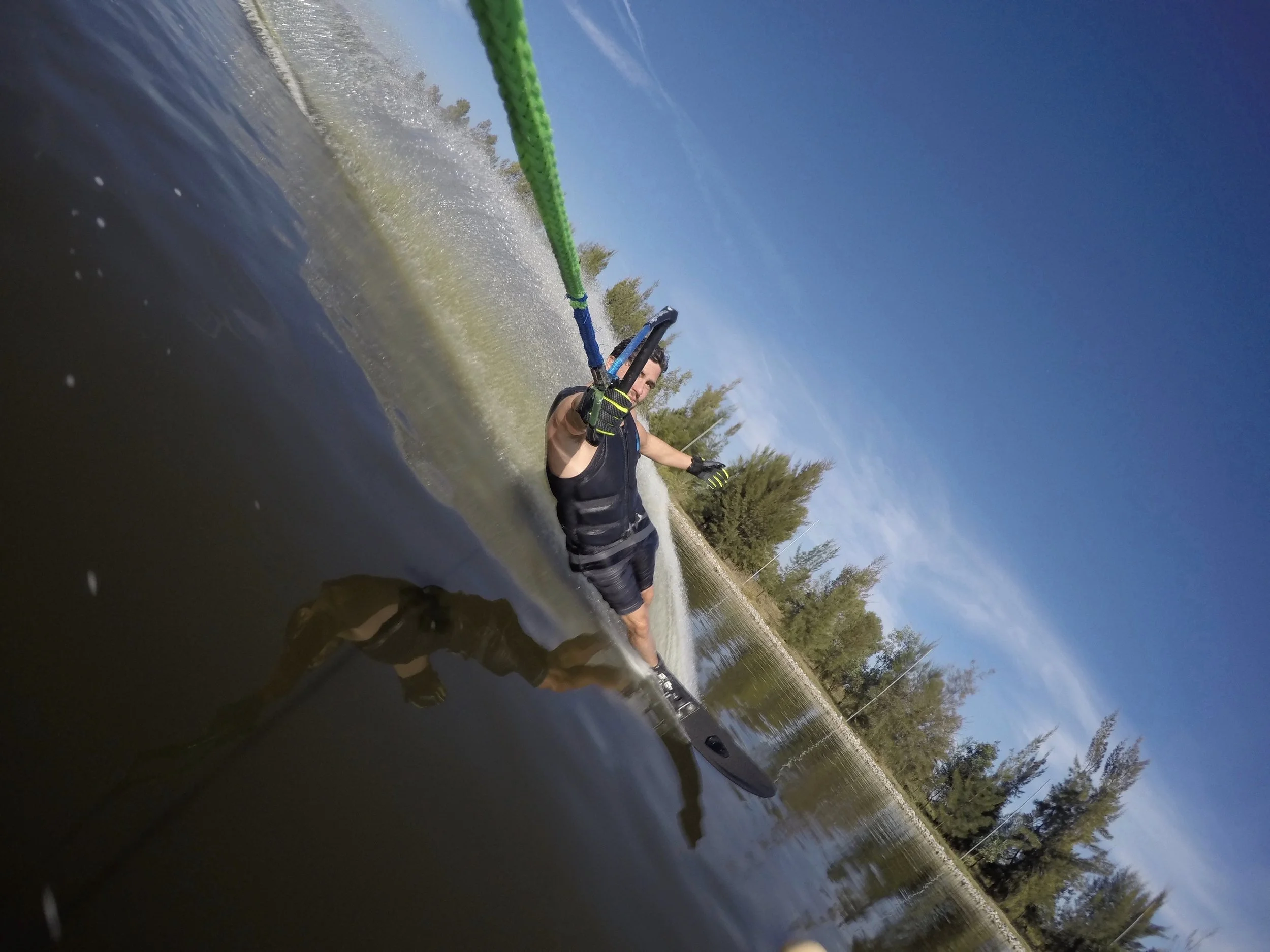 Skier riding warm water at Boca Laguna during winter season, Lake Chapala, Mexico