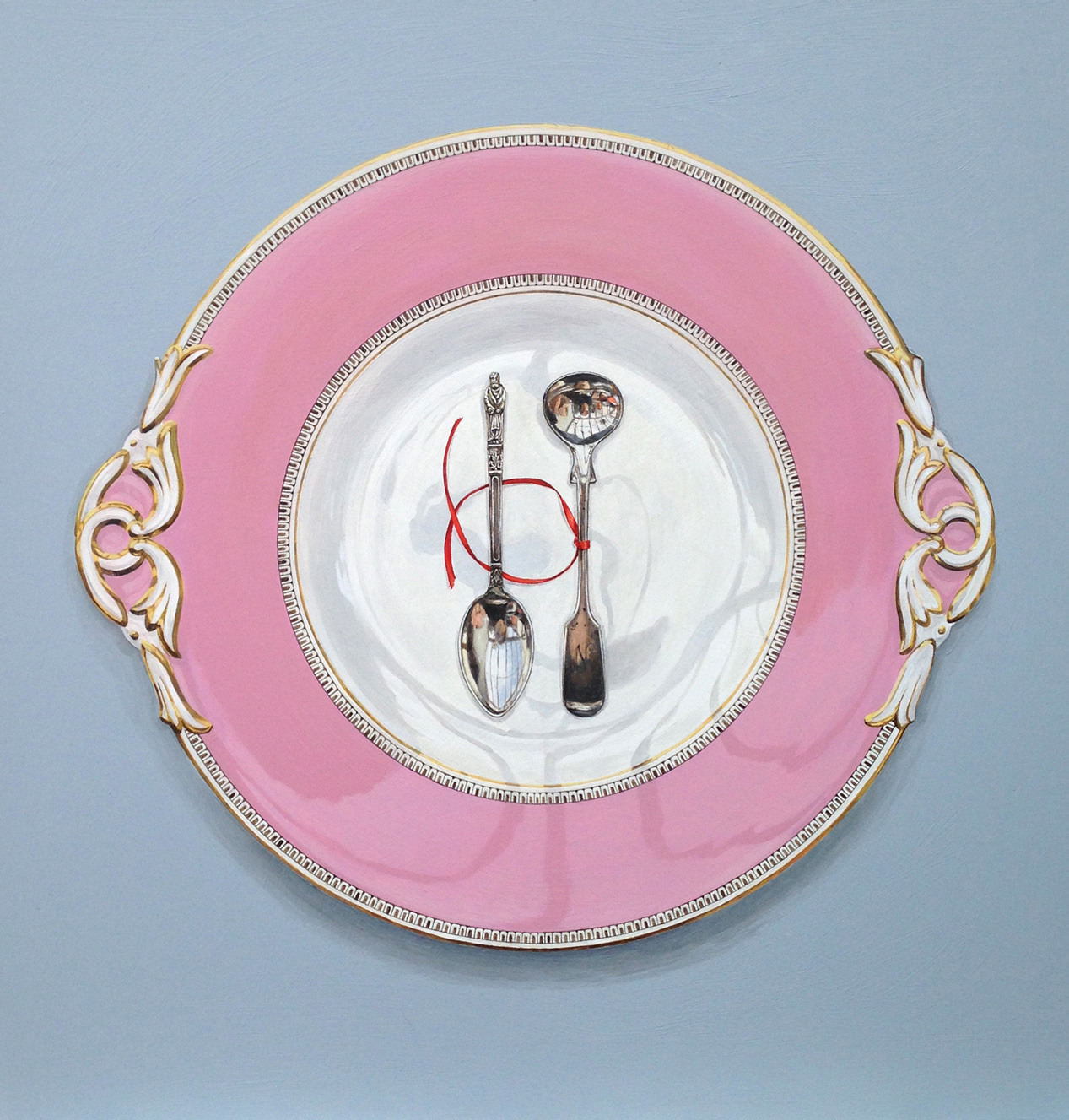 Worcester plate with two spoons and red ribbon