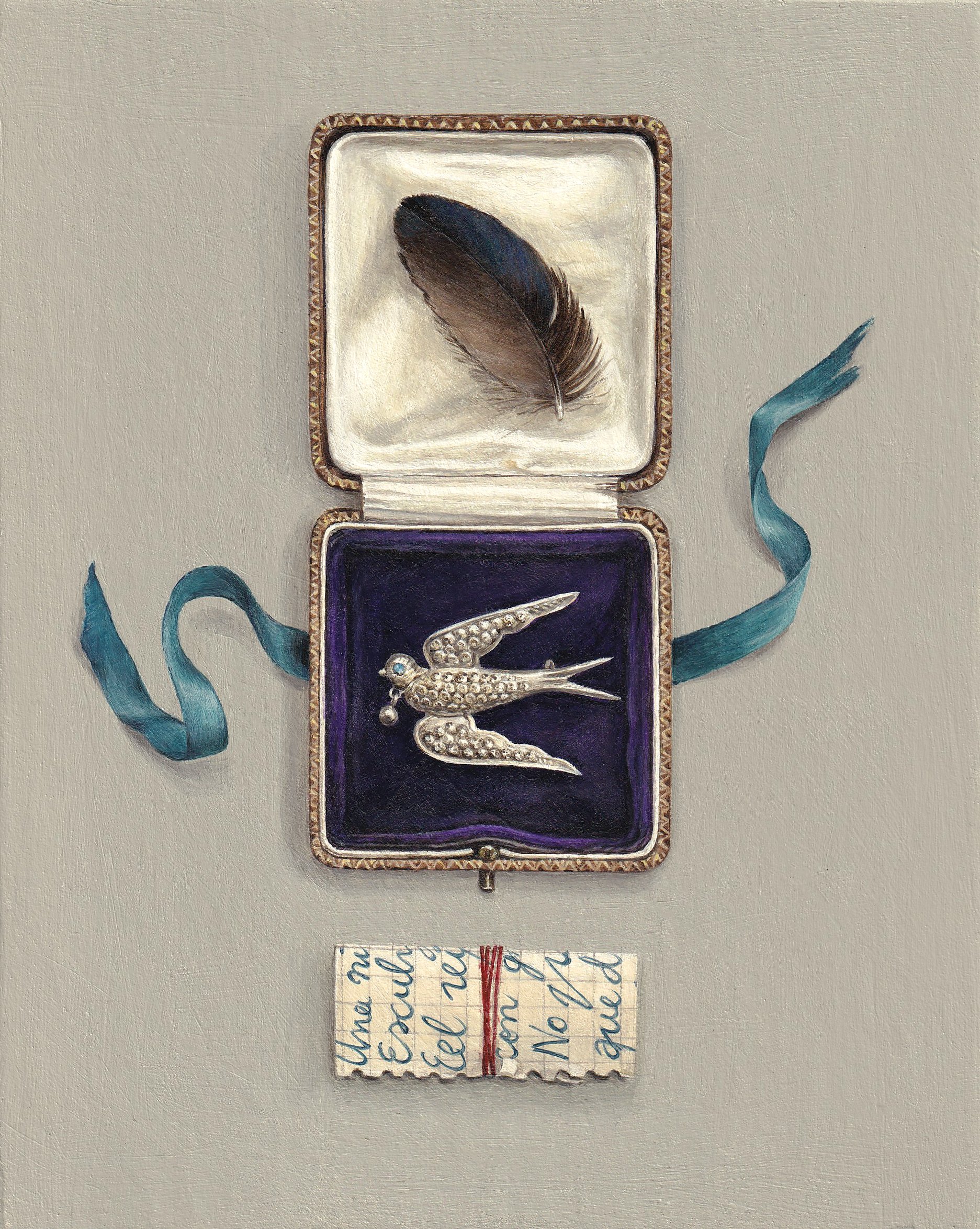 tied poem with brooch and feather 