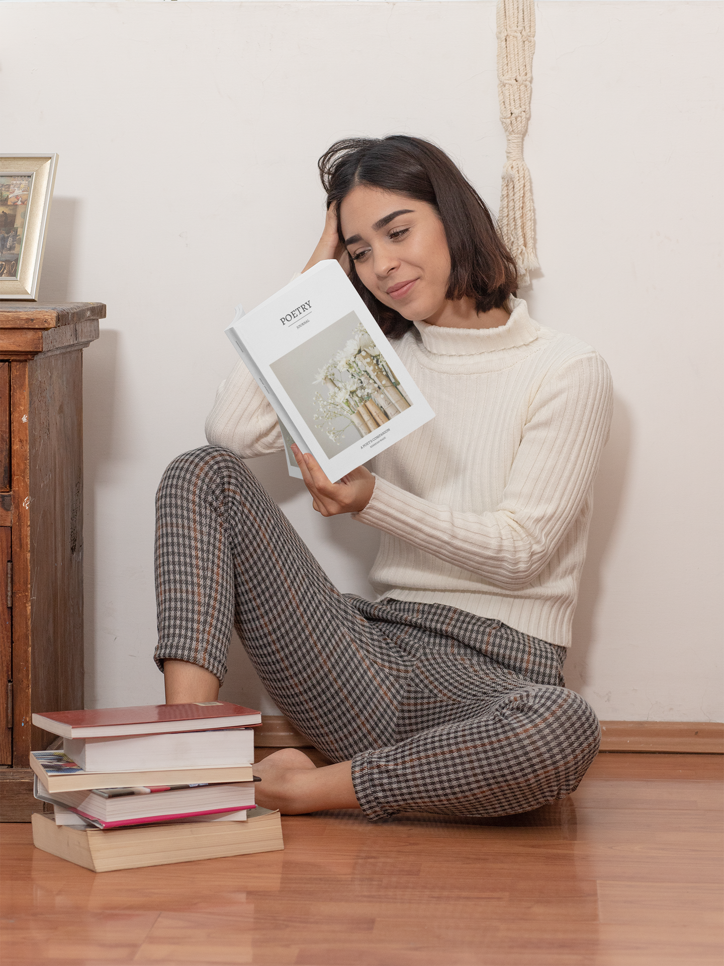 mockup-of-a-woman-reading-a-book-at-home-31040 (1).png