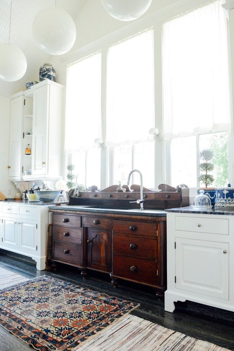 Antique chest is now a part of new kitchen repurposed as sink cabinet so clever!