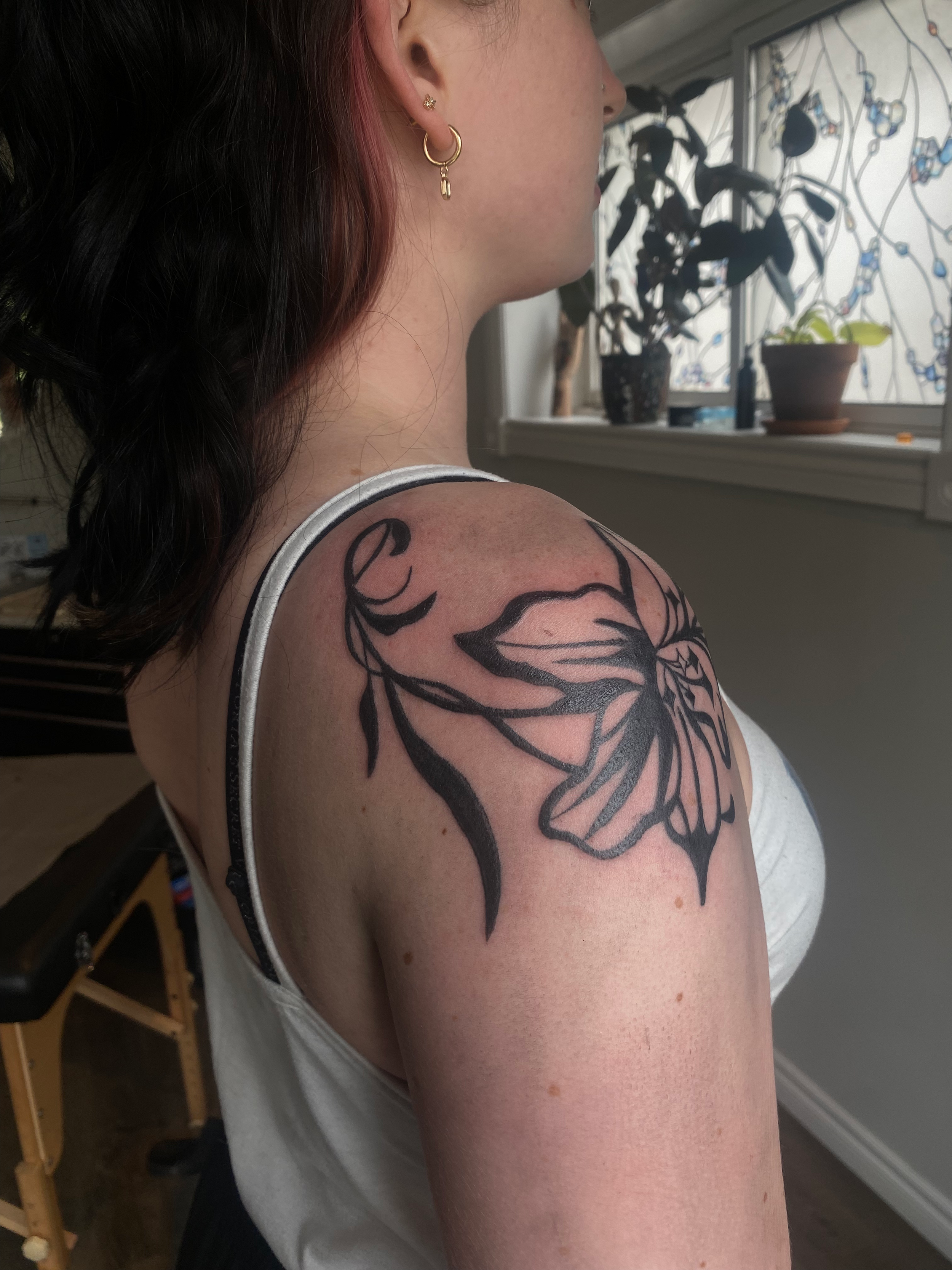 ABI Shoulder flower.png