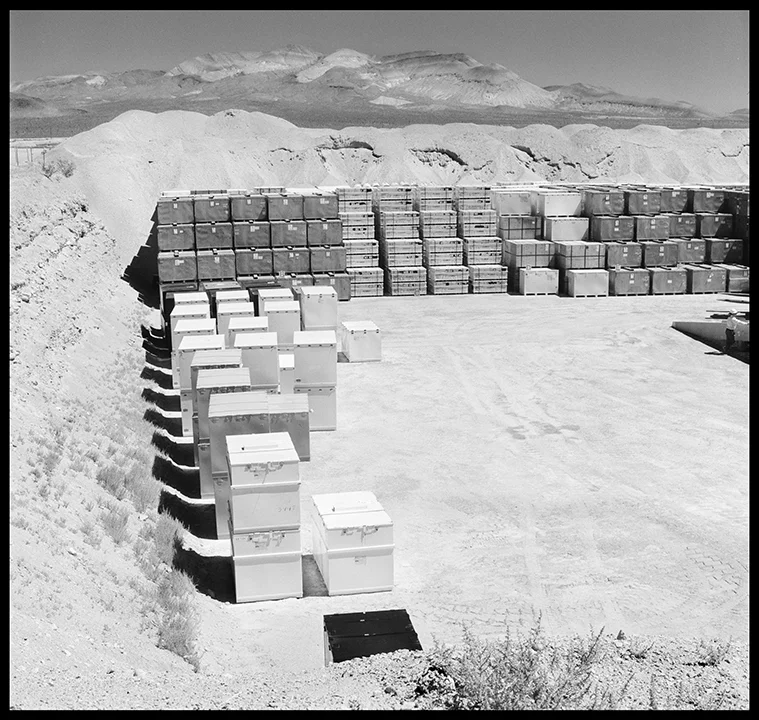 Standard Waste Boxes from Rocky Flats Awaiting Burial in a Trench at the Low-Level Waste Repository at the Nevada Test Site, 2003.