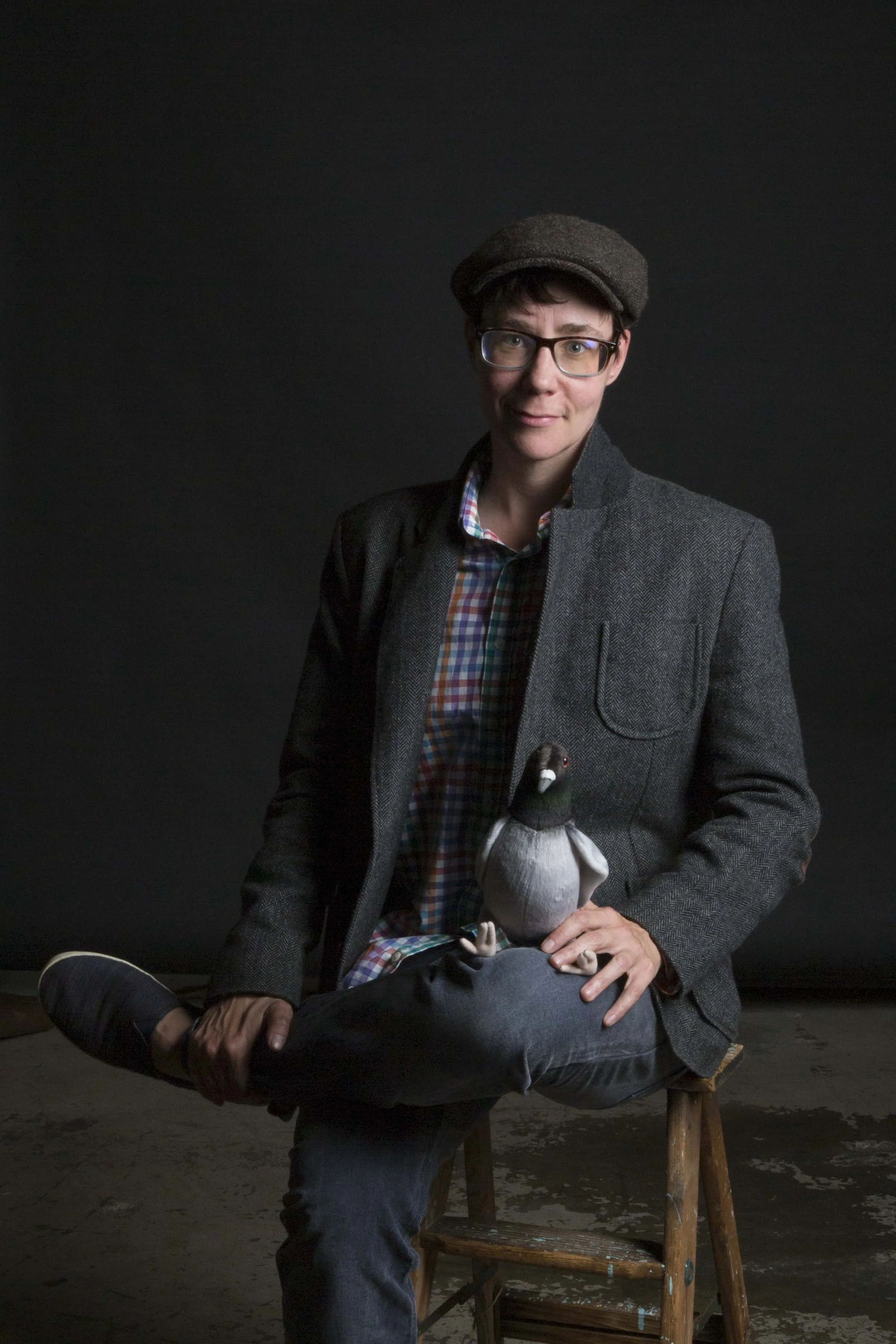 pigeon_sitting_on_human_knee.jpg
