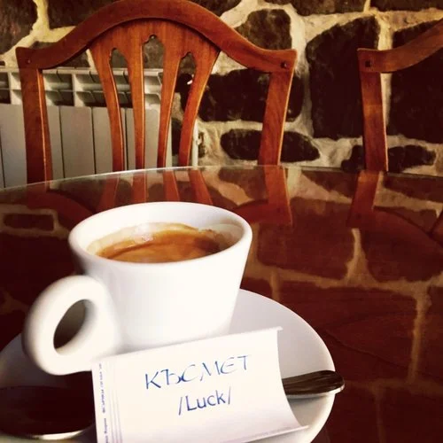 A cup of coffee in Bulgaria almost always comes with a little fortune scroll