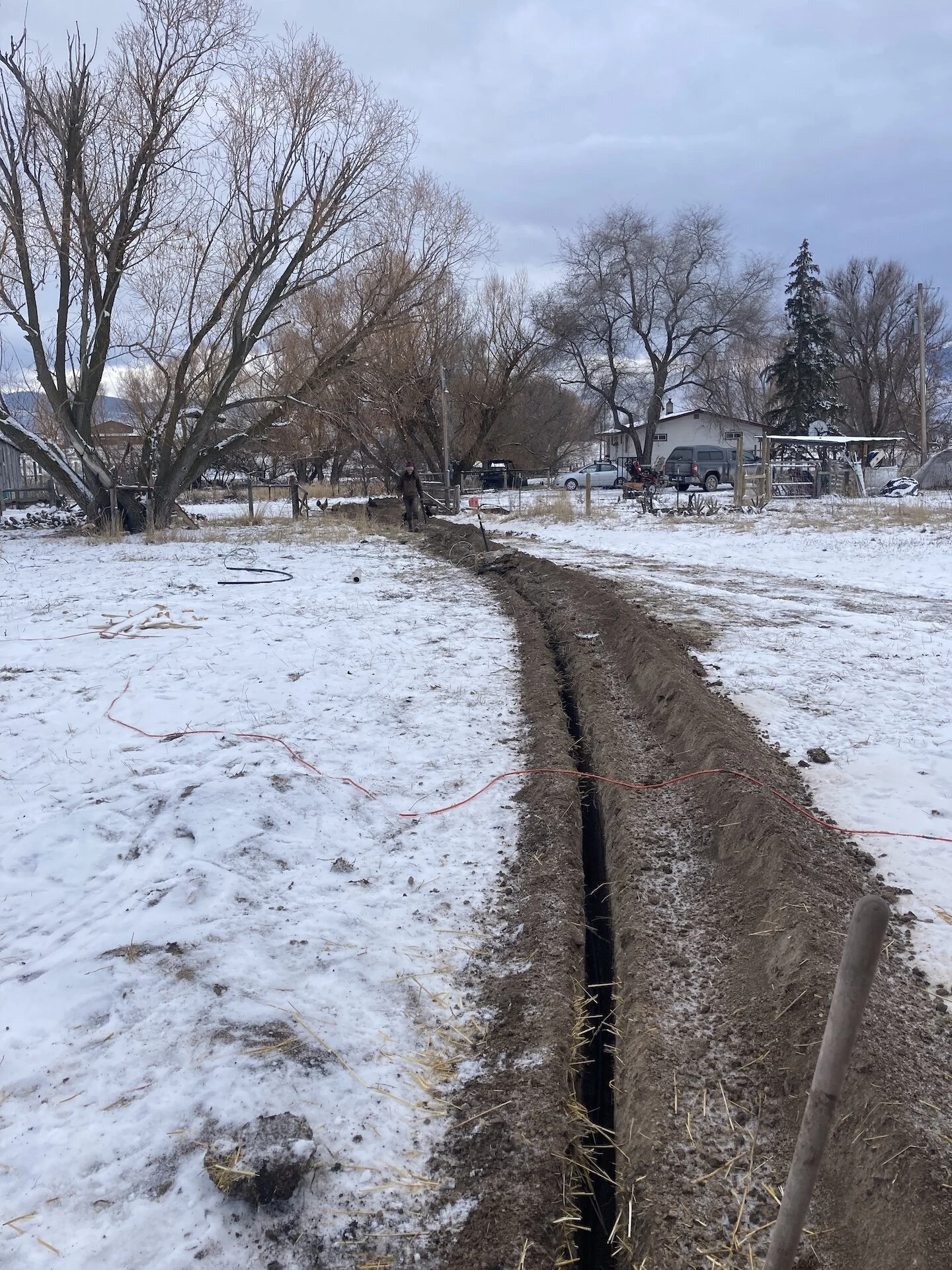  The trench from the main breaker to the greenhouse.  Ended up being sort of epic!  I recommend doing this when the ground is not frozen.   